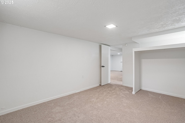 116 SE 153rd Ave, Portland, OR 97233 - unfurnished bedroom with carpet floors, a textured ceiling, and baseboards