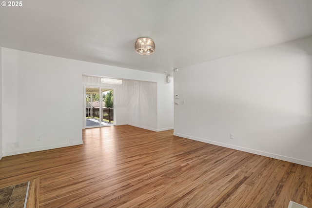 116 SE 153rd Ave, Portland, OR 97233 - spare room featuring light wood-type flooring and baseboards
