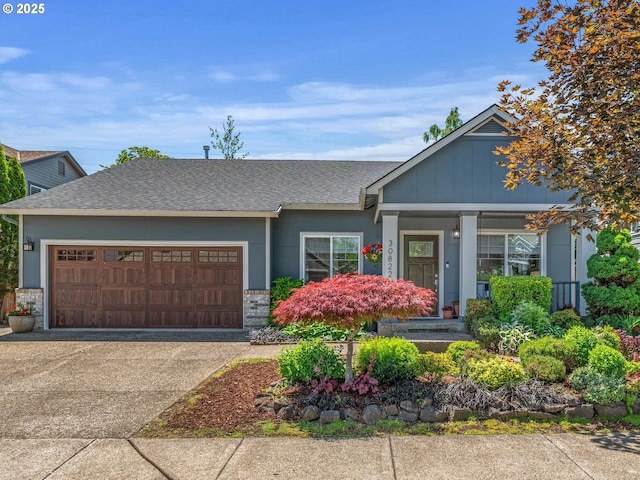 30822 NW Brooking Ct, North Plains, OR 97133 - view of front of property featuring a garage, brick siding, driveway, and roof with shingles