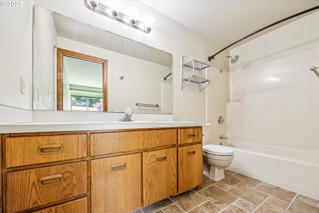 51945 SW Creekview Pl, Scappoose, OR 97056 - full bathroom with shower / bathtub combination, vanity, toilet, and stone finish floors