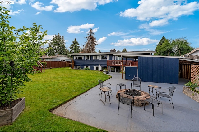 view of patio / terrace featuring an outdoor fire pit