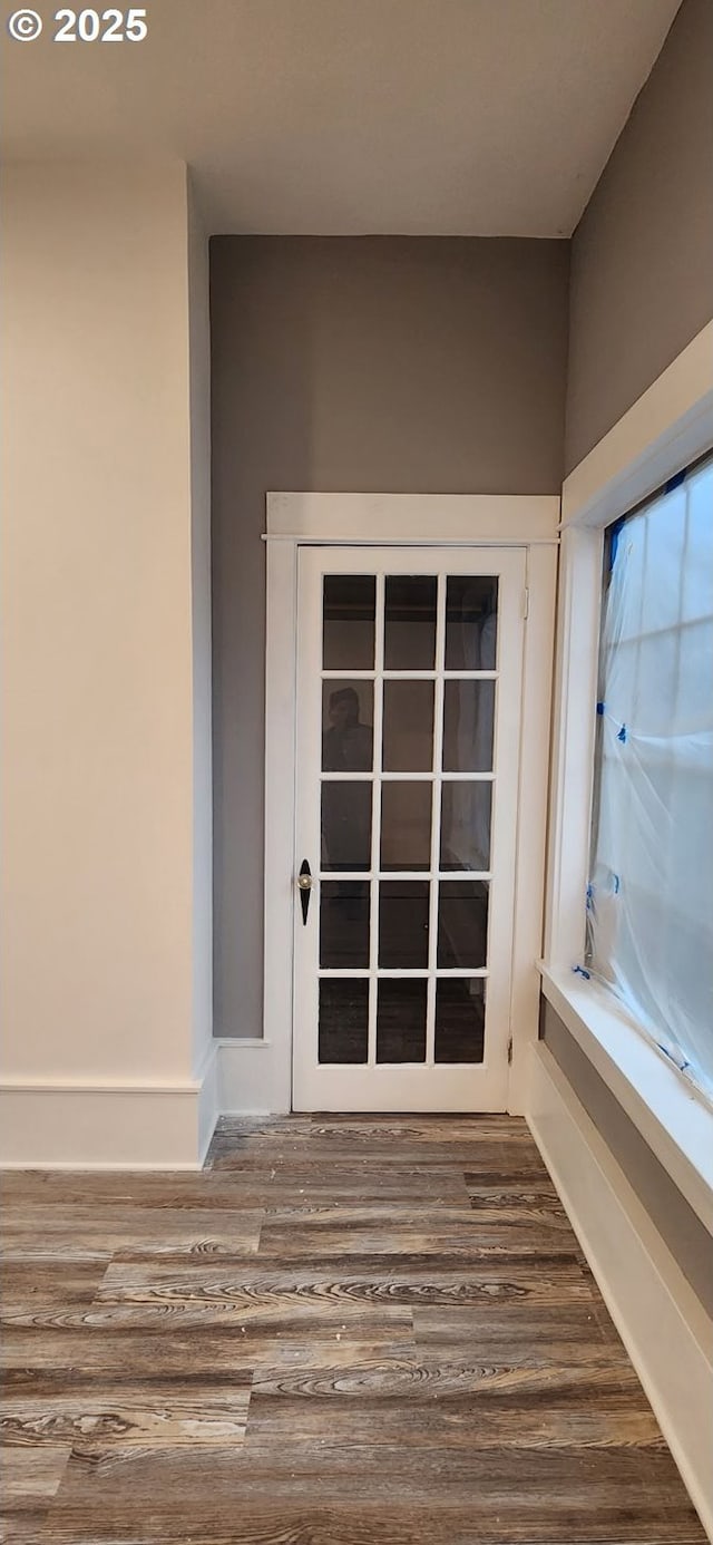 detailed view of wood finished floors and baseboards