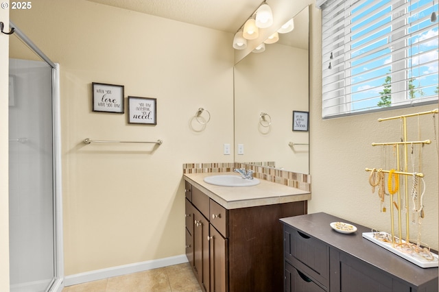 21889 SW Cedar Brook Way, Sherwood, OR 97140 - full bathroom featuring vanity, a shower with door, and tile patterned flooring