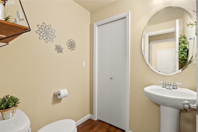 21889 SW Cedar Brook Way, Sherwood, OR 97140 - bathroom featuring toilet and wood finished floors
