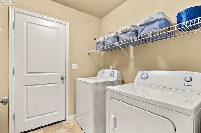21889 SW Cedar Brook Way, Sherwood, OR 97140 - laundry room with separate washer and dryer and light tile patterned floors