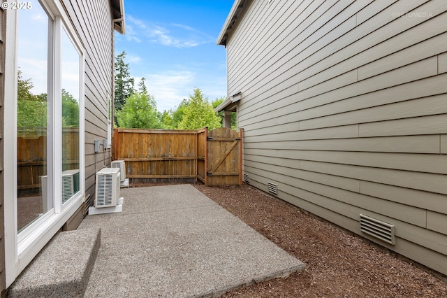21889 SW Cedar Brook Way, Sherwood, OR 97140 - view of patio featuring a gate