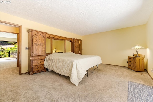 16649 S Holcomb Blvd, Oregon City, OR 97045 - bedroom featuring light colored carpet, a textured ceiling, and baseboards