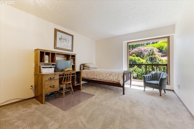 16649 S Holcomb Blvd, Oregon City, OR 97045 - carpeted bedroom featuring a textured ceiling, baseboards, and a desk