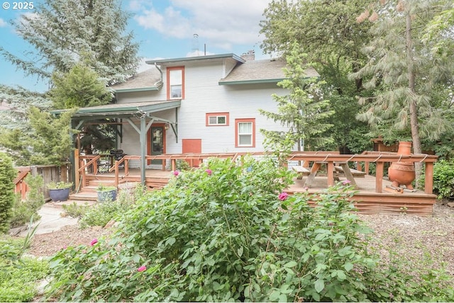 1706 Oak St, La Grande, OR 97850 - rear view of house featuring a wooden deck and roof with shingles