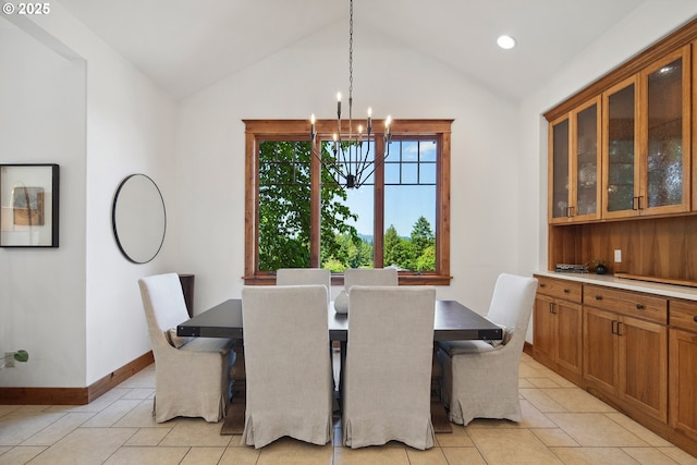 20754 SW Prindle Rd, Tualatin, OR 97062 - dining area with lofted ceiling, a chandelier, baseboards, recessed lighting, and light tile patterned floors