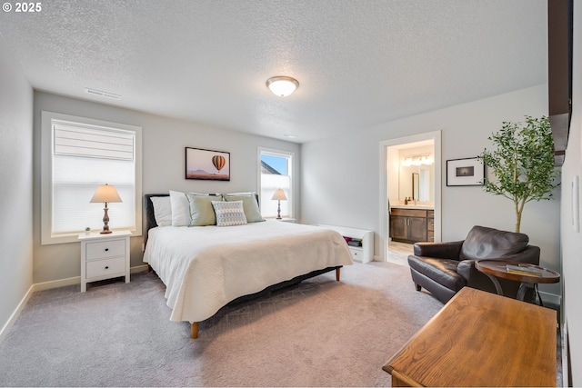 2511 S White Salmon Dr, Ridgefield, WA 98642 - bedroom with a textured ceiling, carpet floors, and ensuite bath