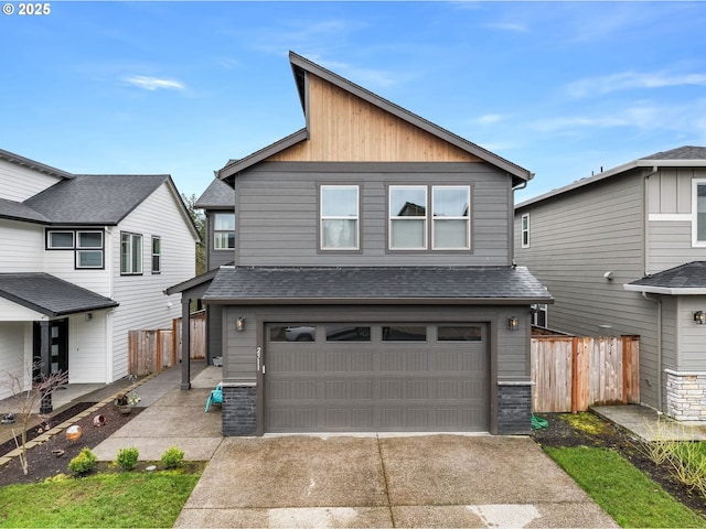 2511 S White Salmon Dr, Ridgefield, WA 98642 - view of front facade with driveway, a shingled roof, and a garage