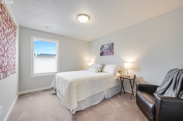 2511 S White Salmon Dr, Ridgefield, WA 98642 - carpeted bedroom featuring baseboards and a textured ceiling