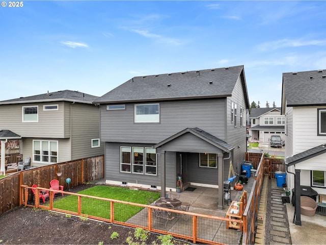 2511 S White Salmon Dr, Ridgefield, WA 98642 - back of house with a patio area, a fenced backyard, and a shingled roof