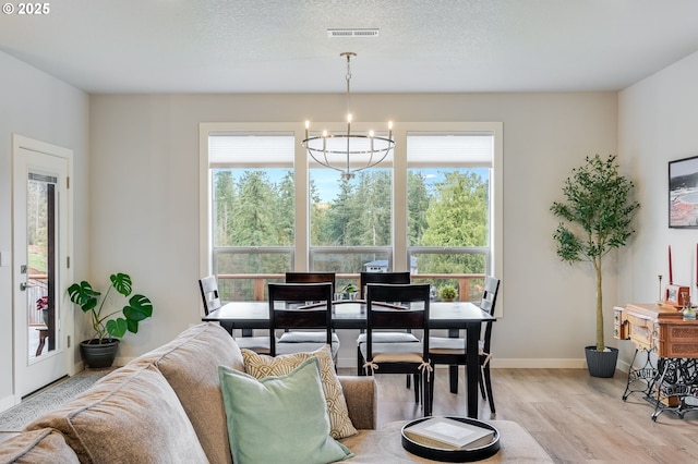 2511 S White Salmon Dr, Ridgefield, WA 98642 - dining room featuring a chandelier and light wood finished floors