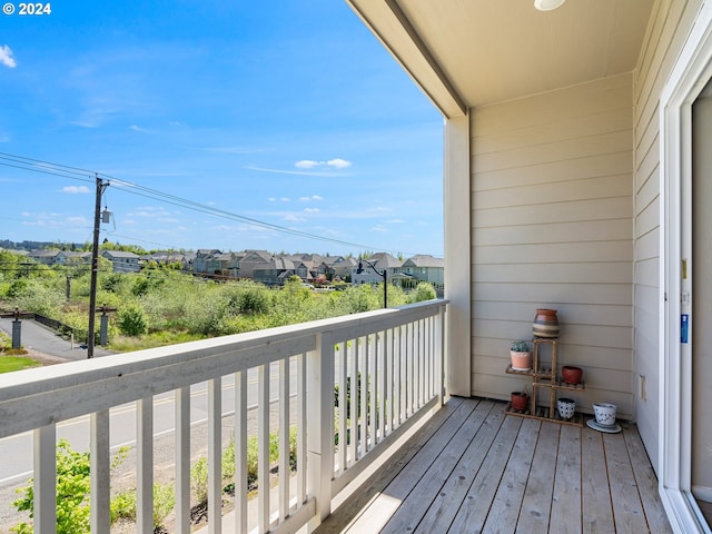 balcony featuring a residential view