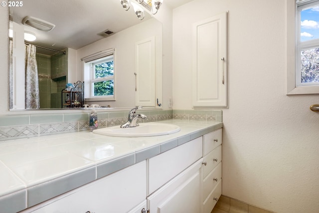 48025 NW Strohmayer Rd, Forest Grove, OR 97116 - full bathroom featuring plenty of natural light, vanity, and a shower with curtain