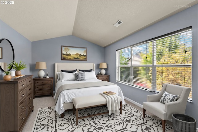 2820 23rd Pl, Forest Grove, OR 97116 - bedroom featuring light carpet, vaulted ceiling, and a textured ceiling
