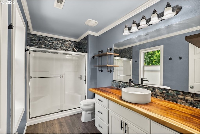 2820 23rd Pl, Forest Grove, OR 97116 - full bathroom featuring a shower stall, vanity, crown molding, toilet, and wood finished floors
