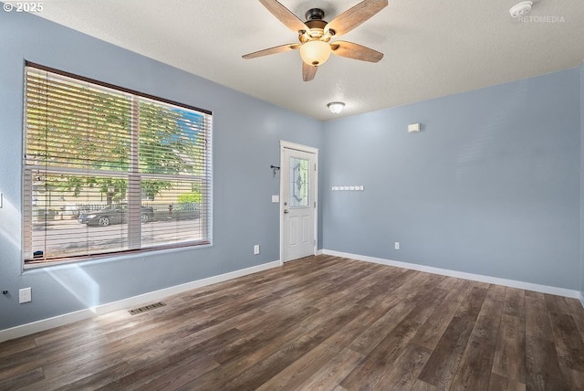 2820 23rd Pl, Forest Grove, OR 97116 - unfurnished room with a ceiling fan, wood finished floors, baseboards, and a textured ceiling