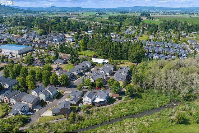 2820 23rd Pl, Forest Grove, OR 97116 - aerial overview of property's location featuring nearby suburban area and a mountain backdrop