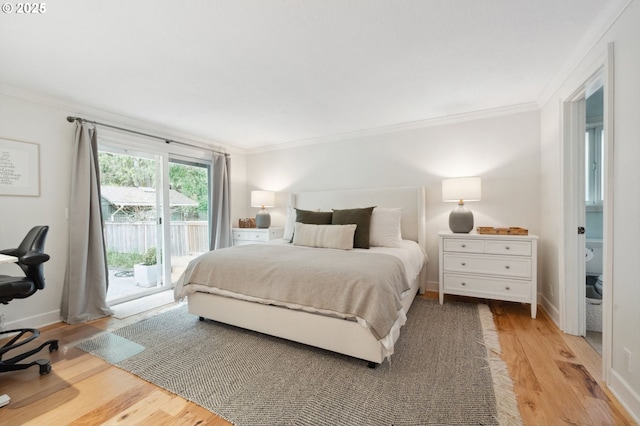 bedroom featuring ornamental molding, access to outside, light wood-type flooring, and baseboards
