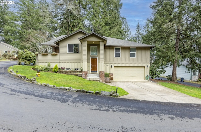 raised ranch with a garage, a shingled roof, brick siding, concrete driveway, and a front lawn