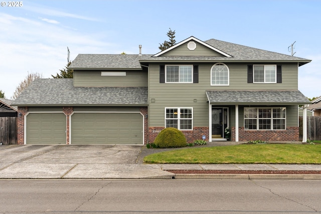 traditional-style house featuring brick siding, a front yard, and fence