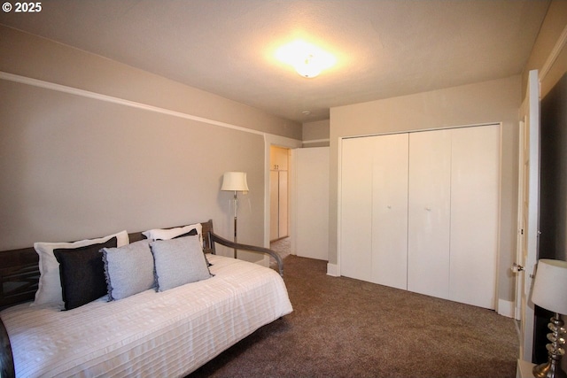 carpeted bedroom with a closet