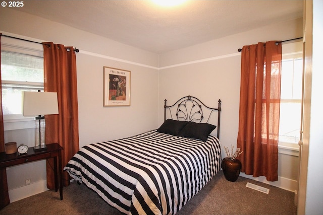 bedroom featuring carpet