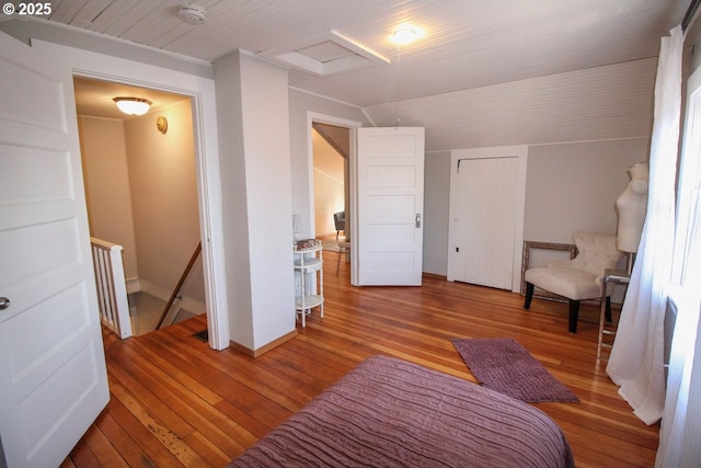 sitting room with hardwood / wood-style flooring