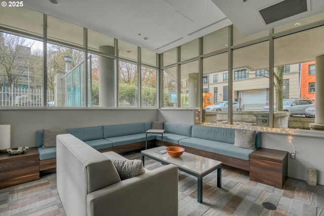 sunroom featuring visible vents