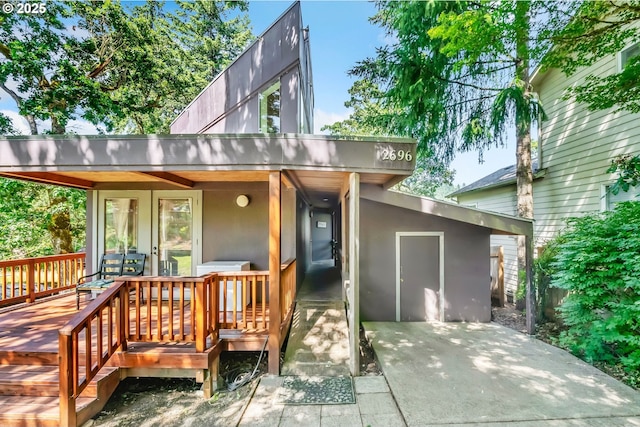 2696 Moon Mountain Dr, Eugene, OR 97403 - rear view of house with stucco siding and french doors