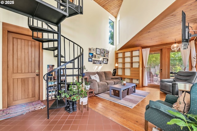 2696 Moon Mountain Dr, Eugene, OR 97403 - living area featuring high vaulted ceiling, stairway, and wood ceiling