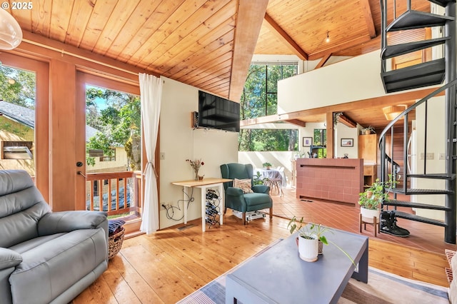 2696 Moon Mountain Dr, Eugene, OR 97403 - living room with a wooden ceiling with exposed beams, wood-type flooring, and stairway