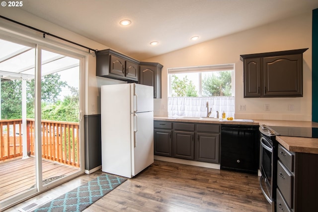 906 N Railroad Ave, Ridgefield, WA 98642 - kitchen featuring freestanding refrigerator, dishwasher, stainless steel electric range, dark wood finished floors, and recessed lighting