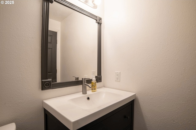 906 N Railroad Ave, Ridgefield, WA 98642 - bathroom with vanity and a textured wall