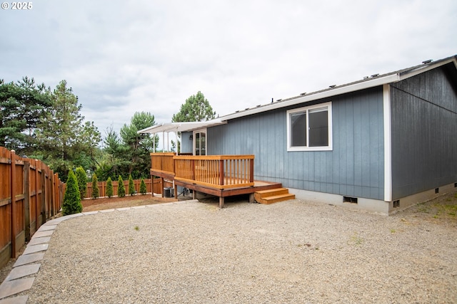 906 N Railroad Ave, Ridgefield, WA 98642 - back of property featuring crawl space and a wooden deck