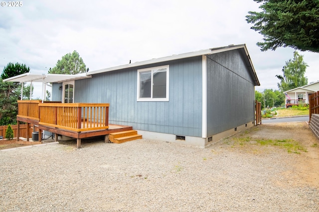 906 N Railroad Ave, Ridgefield, WA 98642 - rear view of house with crawl space and a deck