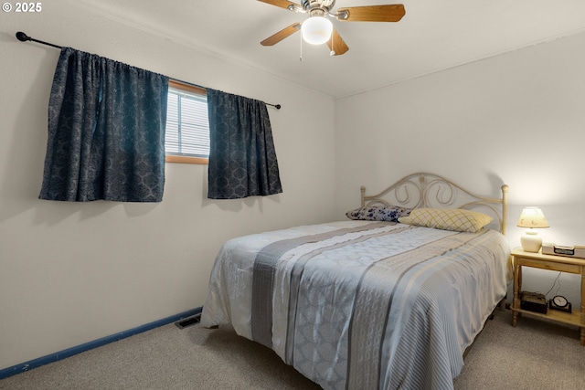 878 NW Warrenton Dr, Warrenton, OR 97146 - bedroom with visible vents, ceiling fan, baseboards, and carpet floors