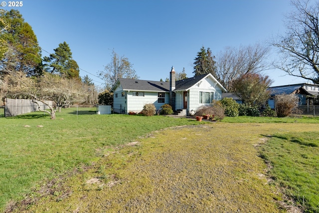 878 NW Warrenton Dr, Warrenton, OR 97146 - exterior space featuring a lawn and fence