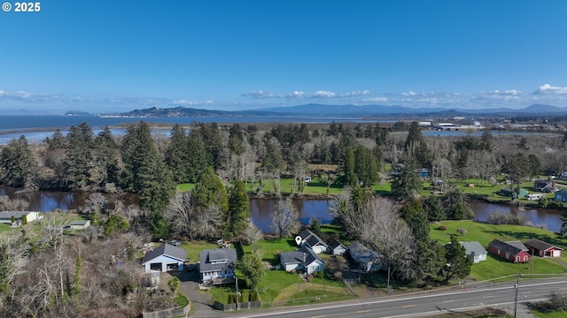 878 NW Warrenton Dr, Warrenton, OR 97146 - bird's eye view featuring a water and mountain view