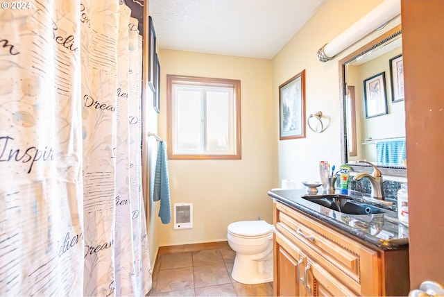 111 N Trade St, Amity, OR 97101 - bathroom with toilet, a shower with curtain, vanity, and baseboards