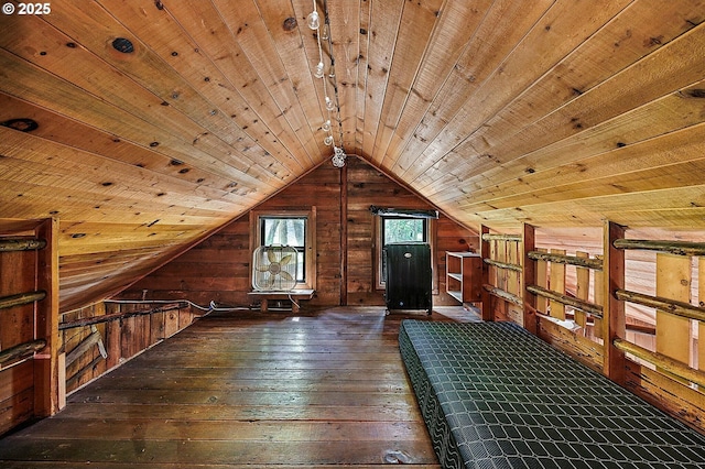 bonus room with lofted ceiling, wooden walls, wood ceiling, and wood-type flooring