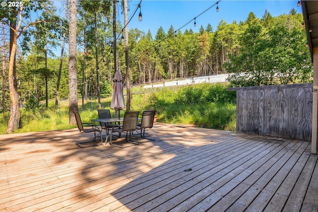 deck featuring outdoor dining space