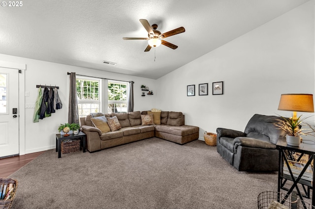 117 E Cushman St, Yacolt, WA 98675 - living area with a ceiling fan, vaulted ceiling, carpet, a textured ceiling, and baseboards