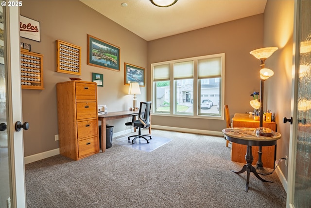 carpeted home office featuring french doors and baseboards