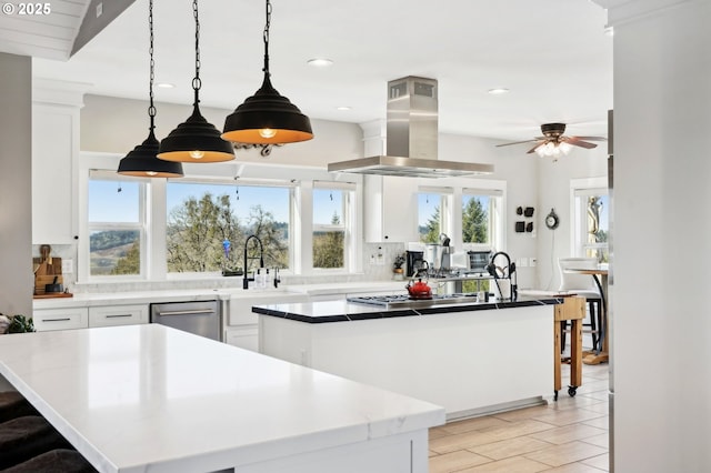 20265 SE Poco Ln, Amity, OR 97101 - kitchen featuring a center island, ventilation hood, decorative backsplash, stainless steel appliances, and recessed lighting
