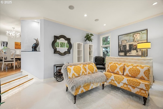 living room with ornamental molding and an inviting chandelier