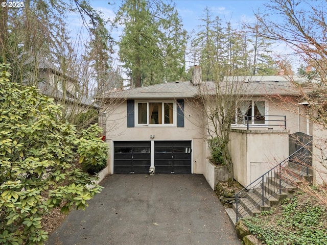 view of front of home with a garage